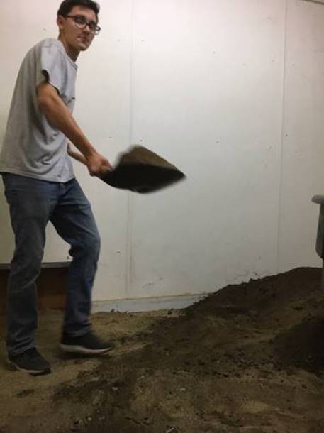 travis shoveling